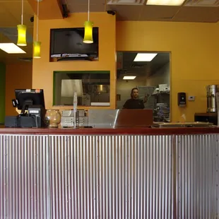 You order your food @ the counter, and one of the staffs in the kitchen preparing our food at Pita Fresh August 23rd 2012 visit.