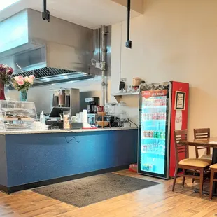 a view of a kitchen and dining area