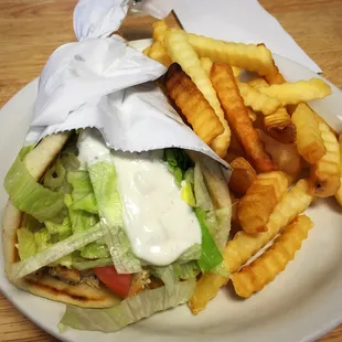 Chicken souvlaki with fries