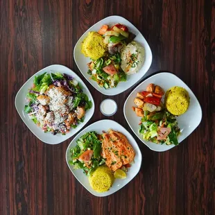 four plates of food on a table