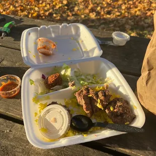 a tray of food on a picnic table