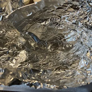 A picture of all the extra meat you get here when you pay for it.