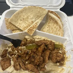 Chicken over hummus with pita