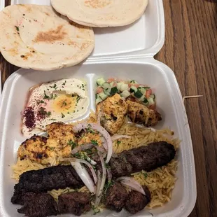 Pita Palace Mix Grill (#21) Kabobs: chicken (top), ground beef (middle), and steak (bottom)