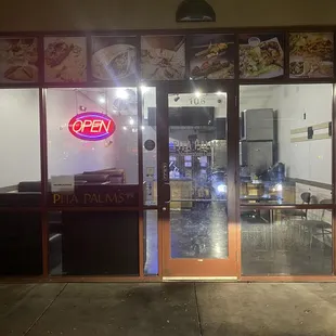 The door is locked, yet the open side is on and the time was 7:15 pm, 45mins before they are said to close.