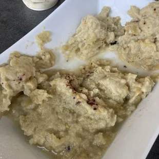 Old, yellowish baba ghanoush was flavorless and globby. No creaminess and no garlic.