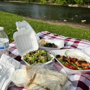 a picnic with a view of the river