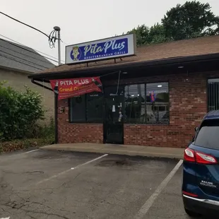 At the end of the strip mall. Shared parking so plenty of spots.