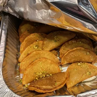 Atayef, a sweet walnut stuffed fried cakes