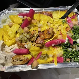 Chicken kafta bowl With lots of tourshi (pickled cabbage with a baby cumin flavor and turmeric)