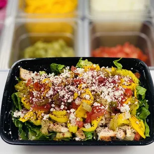 a salad in a plastic container
