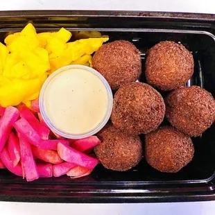 pita bread, pickles, and dip