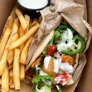 a pita sandwich and french fries