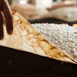 a person making a pita