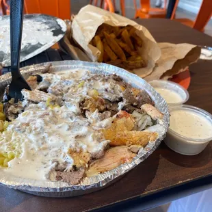 Mixed schwarma plate with fries and garlic sauce