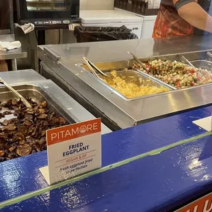 a woman preparing food in a kitchen
