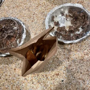 This is a brown paper bag of pita chips and this is how full it was.