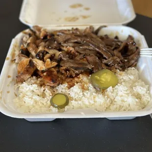 Chicken and beef teriyaki on a bed of rice...