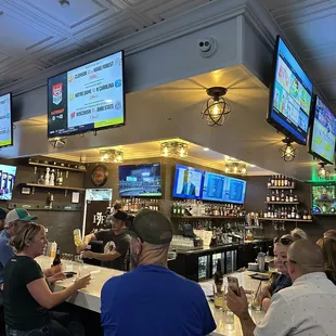 Bar area with lots of screens to watch the games
