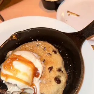 a skillet with ice cream and chocolate chips