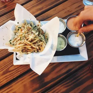 Truffle fries with different aioli&apos;s.
