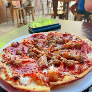 a pizza on a white plate