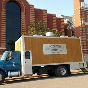 a truck parked in front of a church