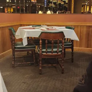a table and chairs in a restaurant