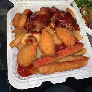 #14 with sweet bbq sauce wings , shrimp , fries , crab sticks and scallops.