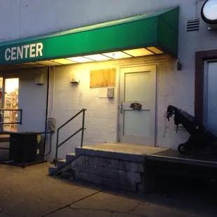 The door with the little pig on it.