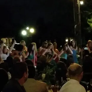 The girls dancing for the crowd