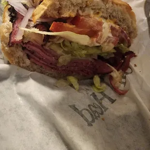 Hot pastrami on a cheddar roll