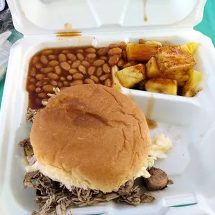 "Captain Jack" jerk chicken with slaw and pineapple. Side of beans and smoked pineapple.