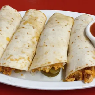 Breakfast tacos $1.99 each build your own. These are chorizo with egg, cheese and jalapeño and very tasty salsa