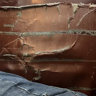 Worn out booth seats covered in tape