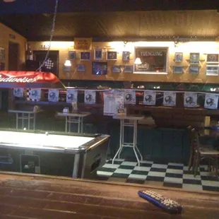 a pool table and a television