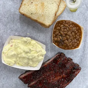 Rib plate with potato salad and brisket baked beans sides!