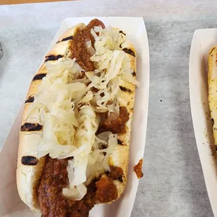 two hot dogs with sauerkraut and sauerkraut