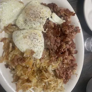 Corned beef hash, eggs (I started eating the eggs before I took the photo)  and hash browns.