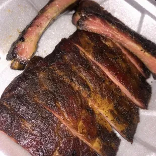 ribs in a styrofoam container