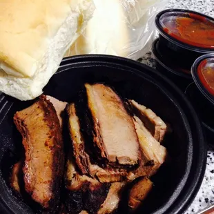 Beef brisket by the pound comes with 4 BBQ sauces and 4 buns (semi hard or soft)