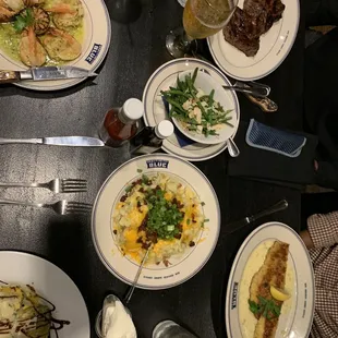 Crab Stuffed Shrimp, Cowboy Ribeye Steak, Green Beans Amandine, Loaded Mashed Potatoes, Wild Mushroom Ravioli, Pistachio Crusted Walleye