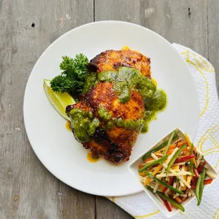 Grilled peruvian chicken thigh with peppers and jicama