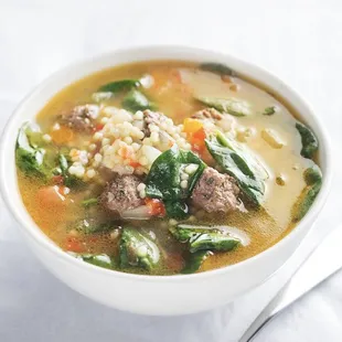 a bowl of beef and barley soup