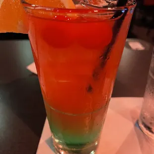 a drink with a slice of orange