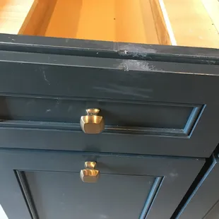 They brought blue paint with them and smeared it on these cabinets.