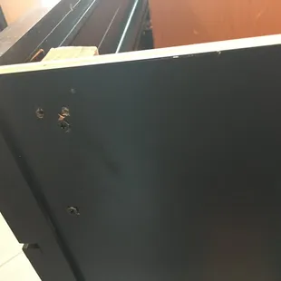 There was no need to screw blocks of wood into the cabinets, let alone this many holes.