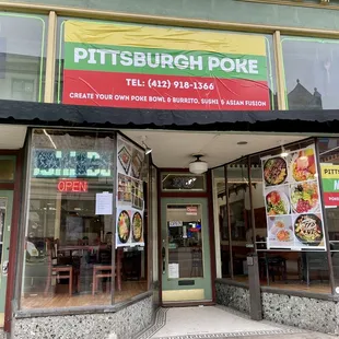 the front entrance of a restaurant