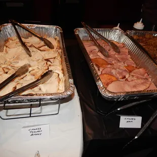 two pans of food on a table