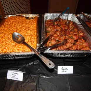 three pans of macaroni and cheese